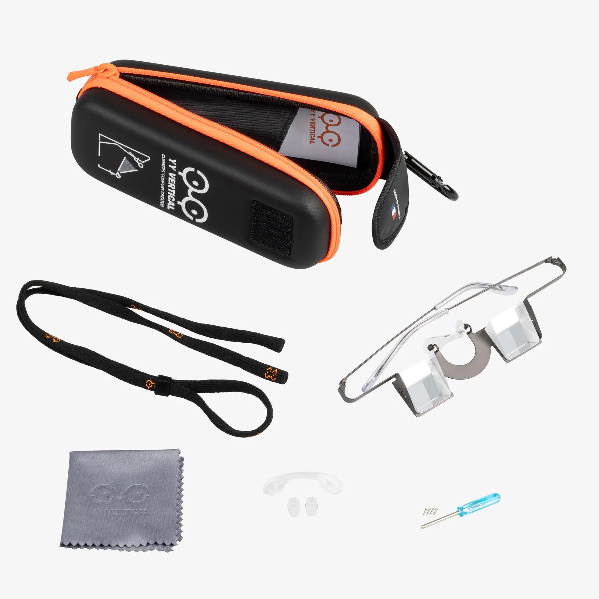 Photo packshot of belay glasses Classic Gris YY Vertical, their case, cloth, spare parts and cord