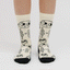 Gif of YY Vertical 's Climber Doodle lifestyle Rock Socks worn by a woman